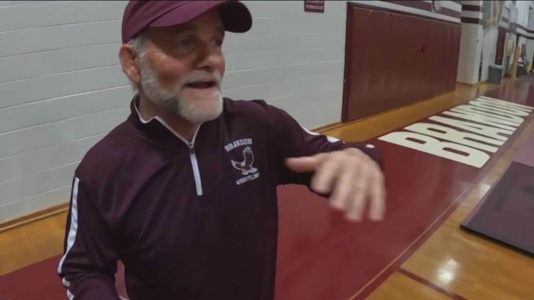 Brandon High wrestling coach retires